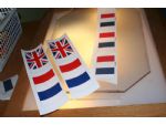 Flag transfers before printing and completed flags ready for cutting.